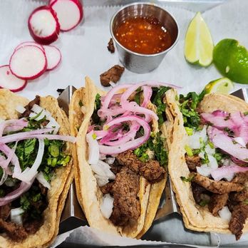 La Takeria signature dishes Al Pastor TacosCarne Asada TacosLengua TacosChorizo Tacos
